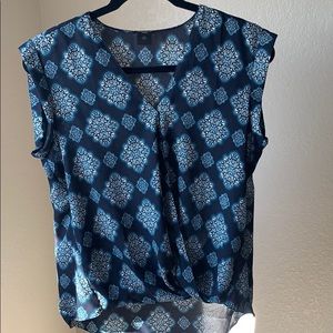 Ladies cross-over feature blouse.